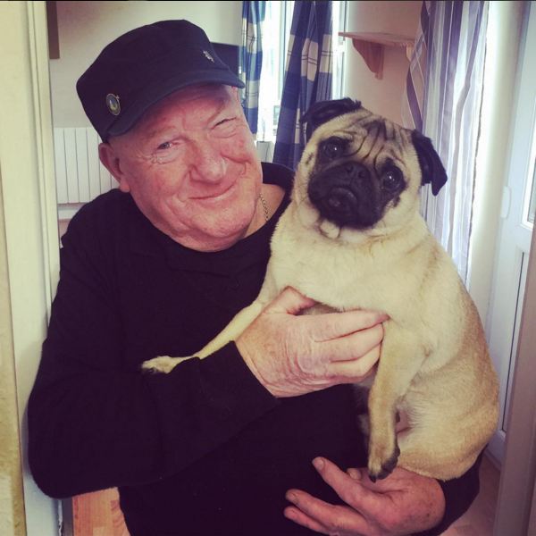 hugging granddad pug