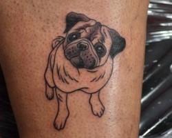 12 Doggie Tattoos That’ll Give You a Fresh Perspective on Ink